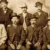 Bat Masterson (standing second from right), Wyatt Earp (sitting second from left), and other deputy marshals during the Wild West era
